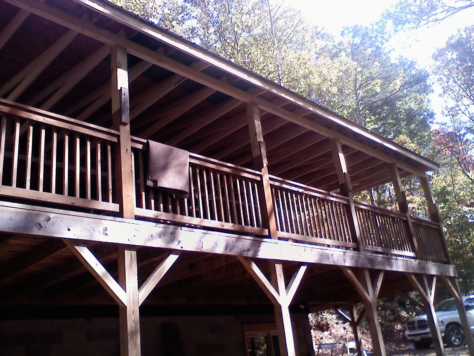 Timber framing under a new elevated porch and deck — Roof Leak Repair in North Salem by Roofing Brothers